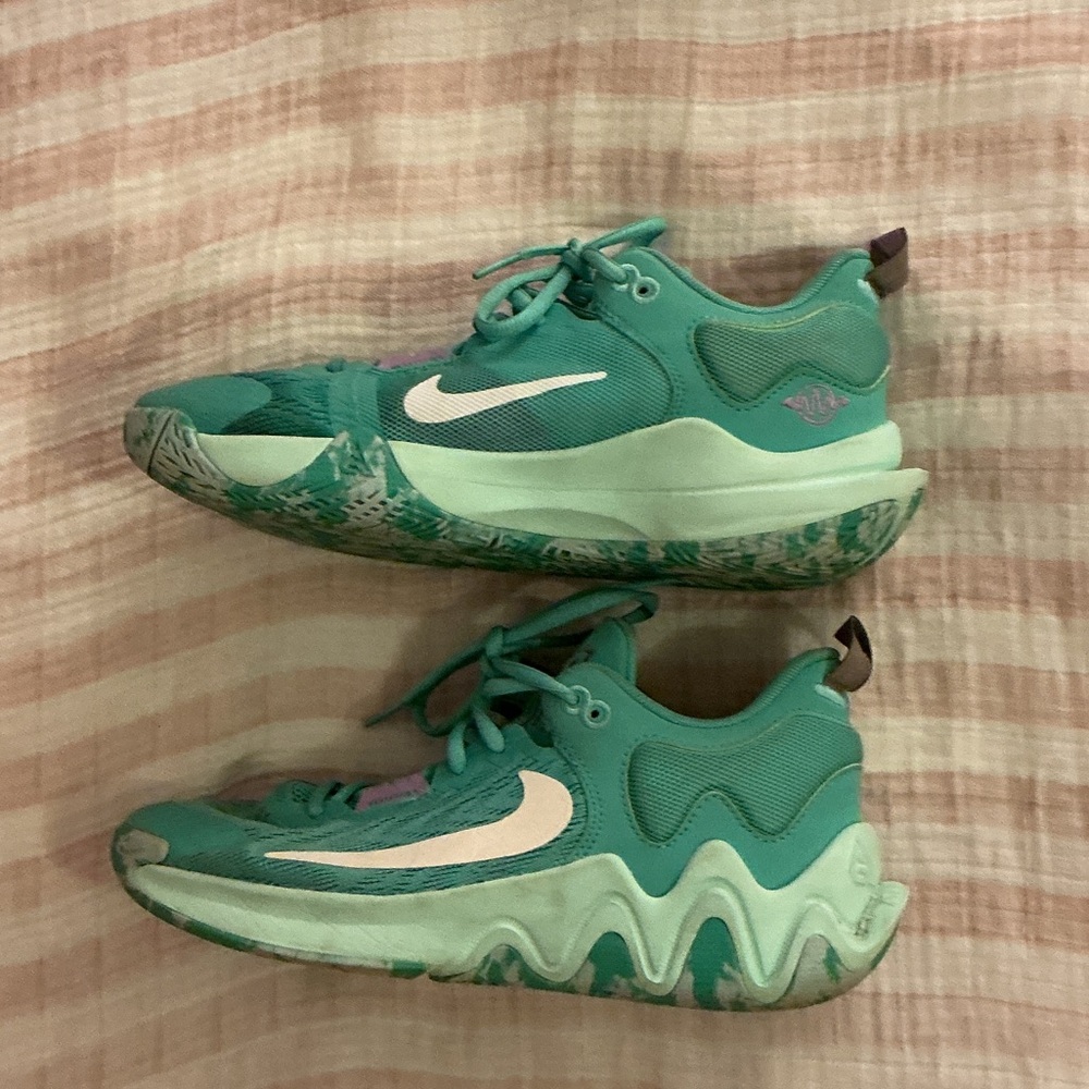 Nike women’s teal basketball/volleyball shoes